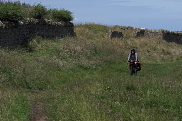 Vicki riding in a field 1